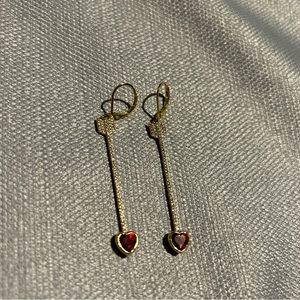 Kate Spade arrow dangle earrings.